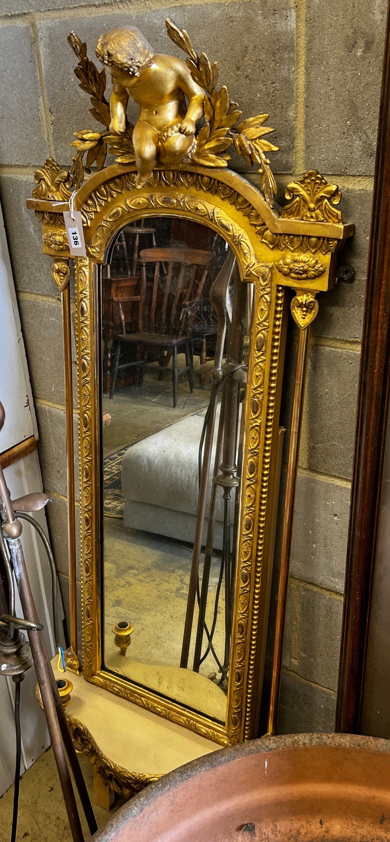 A Victorian giltwood and composition girandole pier glass, width 56cm, height 145cm